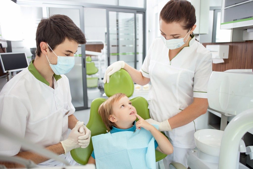 Young boy with dentists