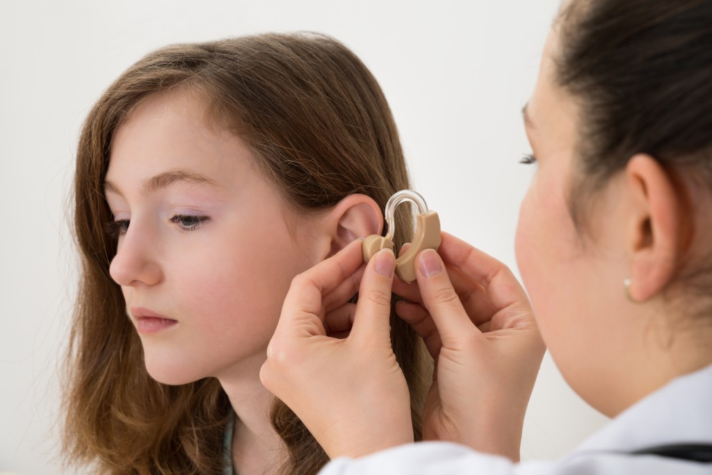 applying a hearing aid