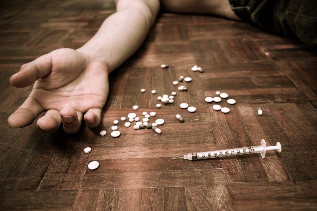 drugs narcotic syringe on floor