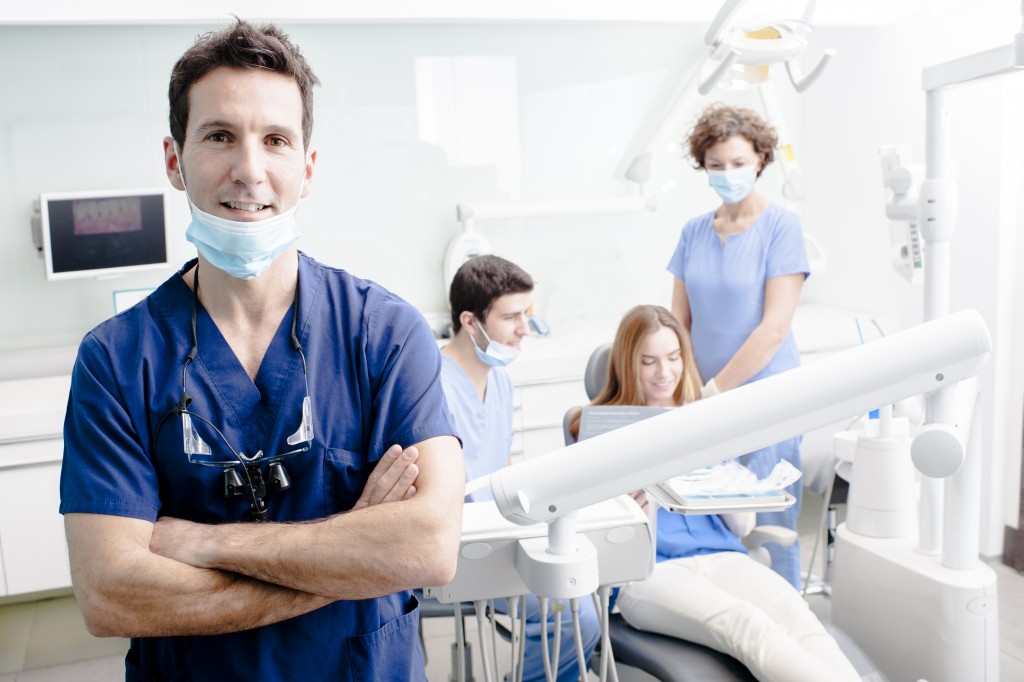 Dentist and his team