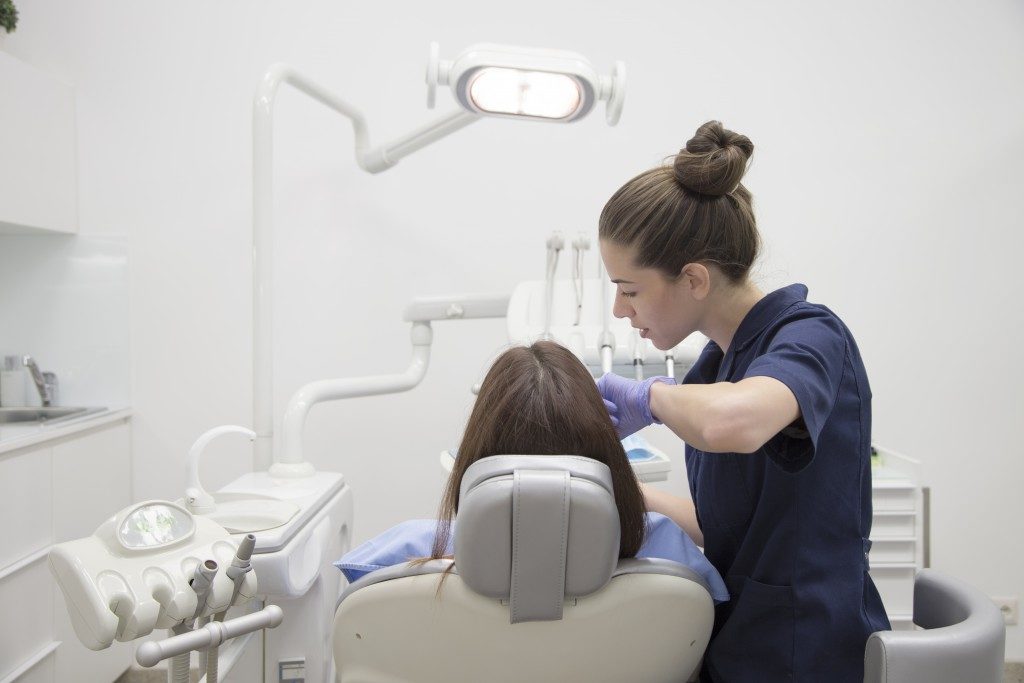 dentist treating a patient's teeth