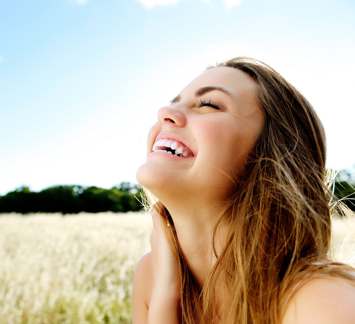 woman smiling outdoors