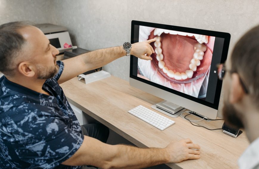 dentist having a client teeth check-up