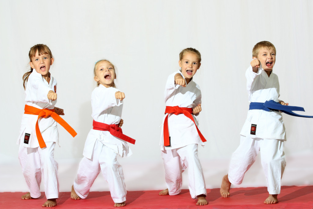 Kids doing karate poses