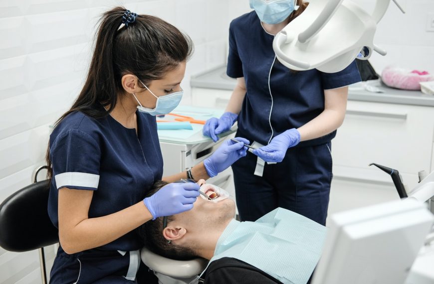 dentist with assistant